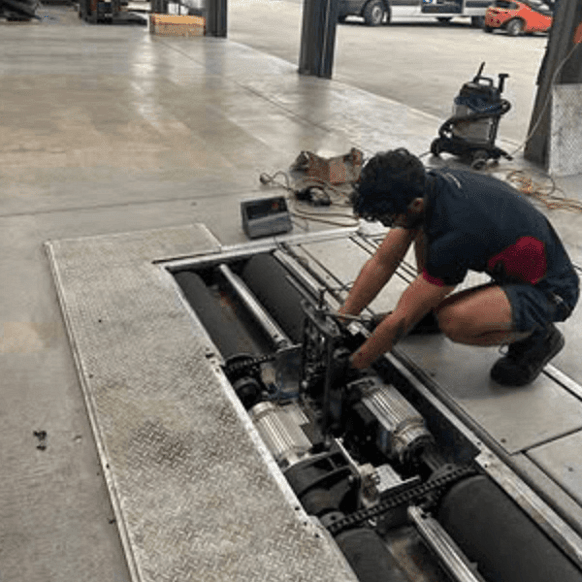 AECS member servicing a brake tester