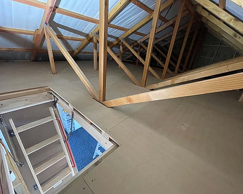 Roof space storage flooring with timber framing