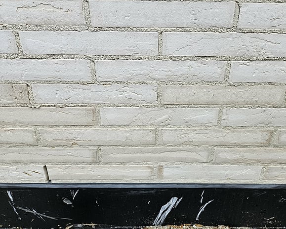Brick with flush mortar