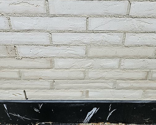 Brick with flush mortar