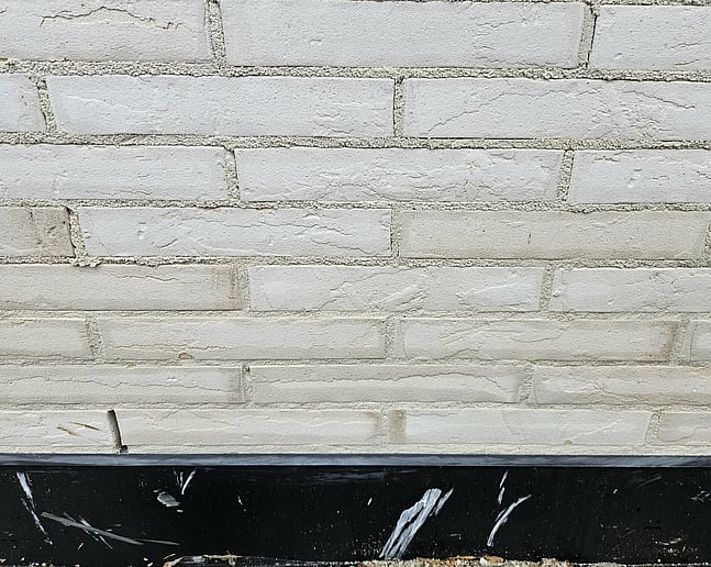 Brick with flush mortar