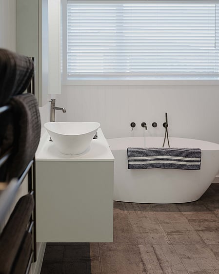 Main bathroom with freestanding bath
