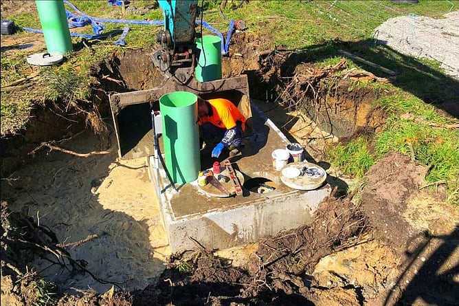 septic tank system being installed