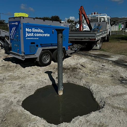 Crewmix CM1000 machine pouring post hole