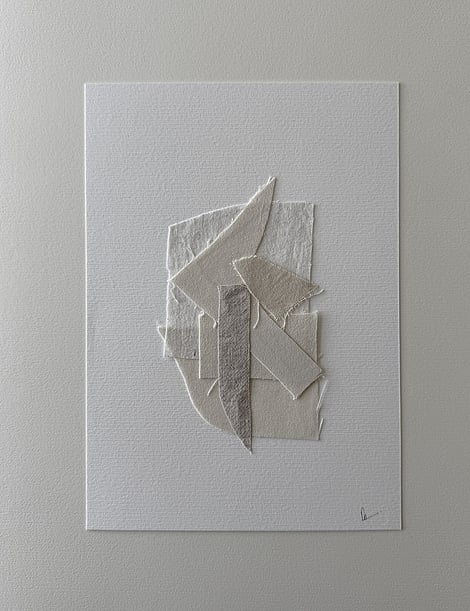 full image of collage with tonal linen and cotton fragments layered on fabriano, showing soft frayed edges and handwritten signature lower right corner 