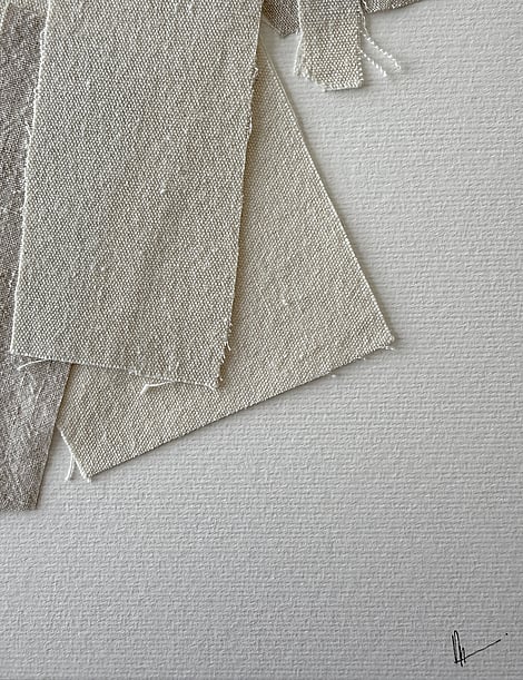 detail of fabriano surface texture, cotton fragment with soft frayed edge and handwritten signature lower right corner