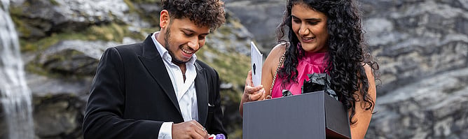Couple celebrating with gift box