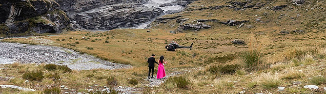 Couple celebrating proposal by helicopter in Queenstown