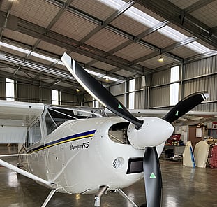 Aircraft ready for detailing inside hangar