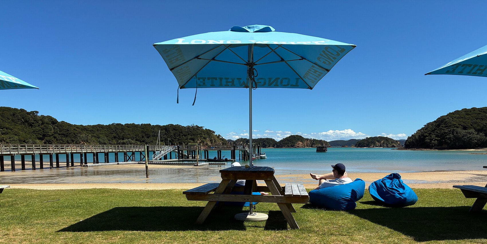 Scenic view of Otehei Bay beach on Urupukapuka Island, a popular day trip from Russell Wharf