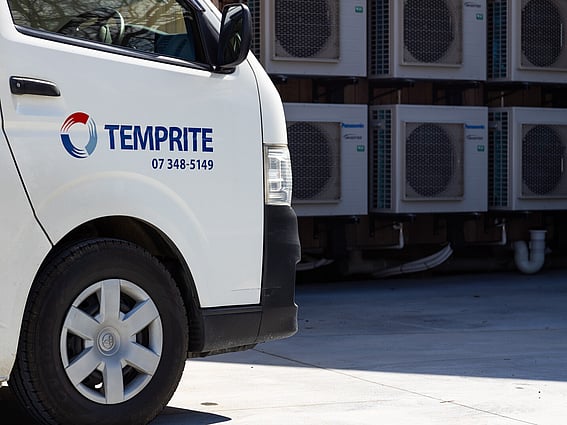 Temprite van parked beside commercial outdoor units