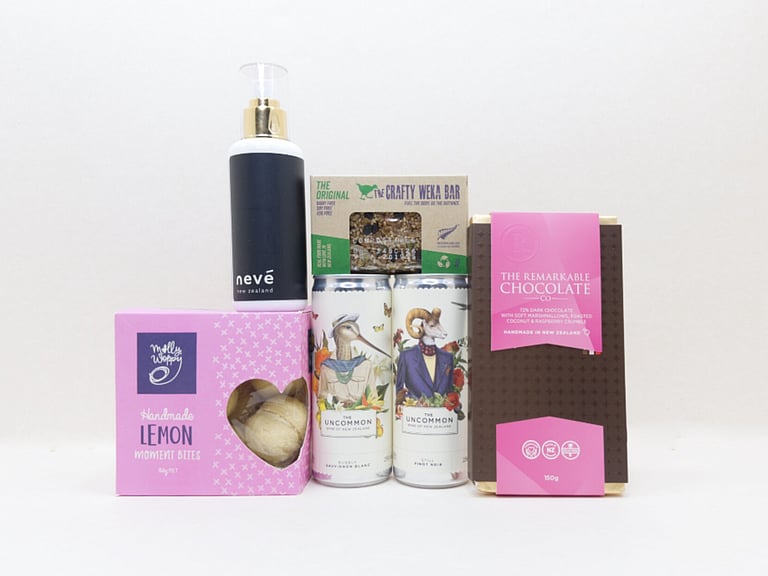You Deserve This self-care gift box with Lemon Moment cookies, Neve room spray, Crafty Weka muesli bar, and Remarkable chocolate, thoughtfully presented in a premium gift box