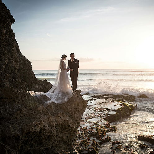 Luxury Bali wedding venue with tropical gardens and romantic resort setting.