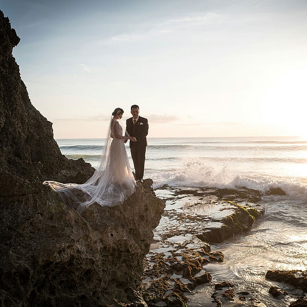 Luxury Bali wedding venue with tropical gardens and romantic resort setting.