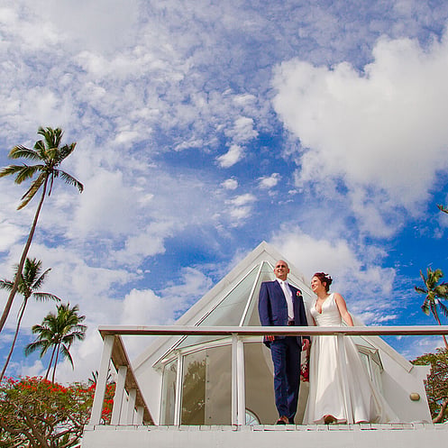Luxury Fiji destination wedding overlooking a tropical beach and ocean lagoon.