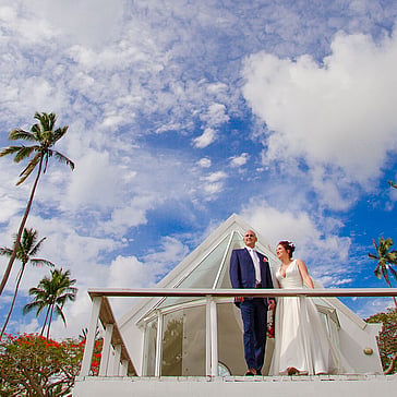 Luxury Fiji destination wedding overlooking a tropical beach and ocean lagoon.