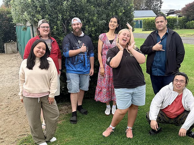 Hugh (back row in red jumper), along with some fellow Pathways students.