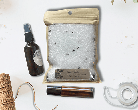 an essential oil bottle with a birth chart blend, an essential oil mist and some bath salts
