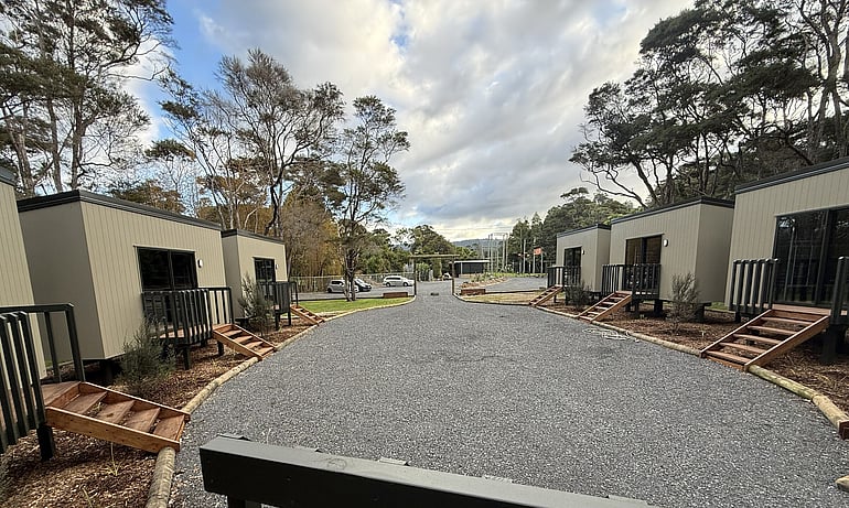 Ferndale Village offers a peaceful, smaller-scale setting&mdash;perfect for connection, reflection, and community. Nestled in native bush with a stream running alongside, it provides a quieter, more private camp experience. 