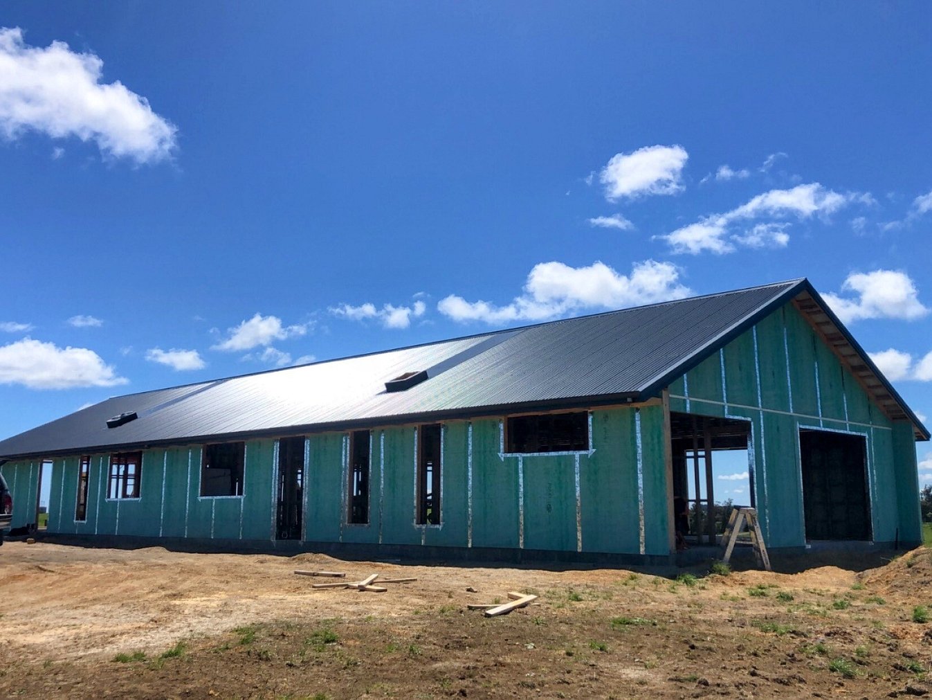  Image of dark exterior cladded new build home with Waikato rural outlooks. Built by Otorohanga builders, Coull Builders.