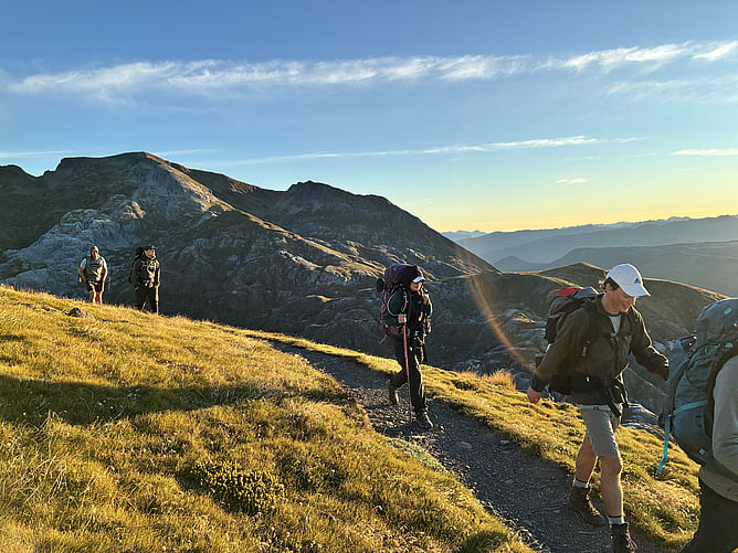 Ethan (front) and the team on one of the multi-day tramps (hikes) that are part of the Off the GRID experience.