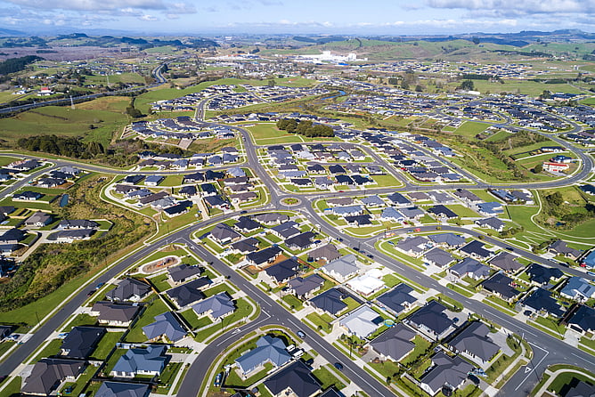 Aerial view illustrating urban growth and planning reform challenges in New Zealand