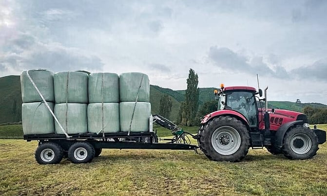 Global 12 Tonne Tip Trailer with hay bales