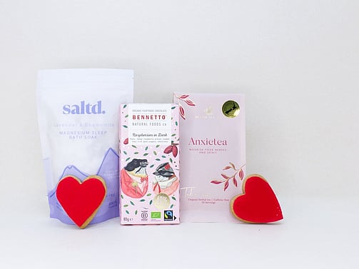 Rest & Restore self-care gift box featuring Anxietea tea, Saltd bath salts, Bennetto chocolate, and sweet treats, beautifully packaged for gifting.