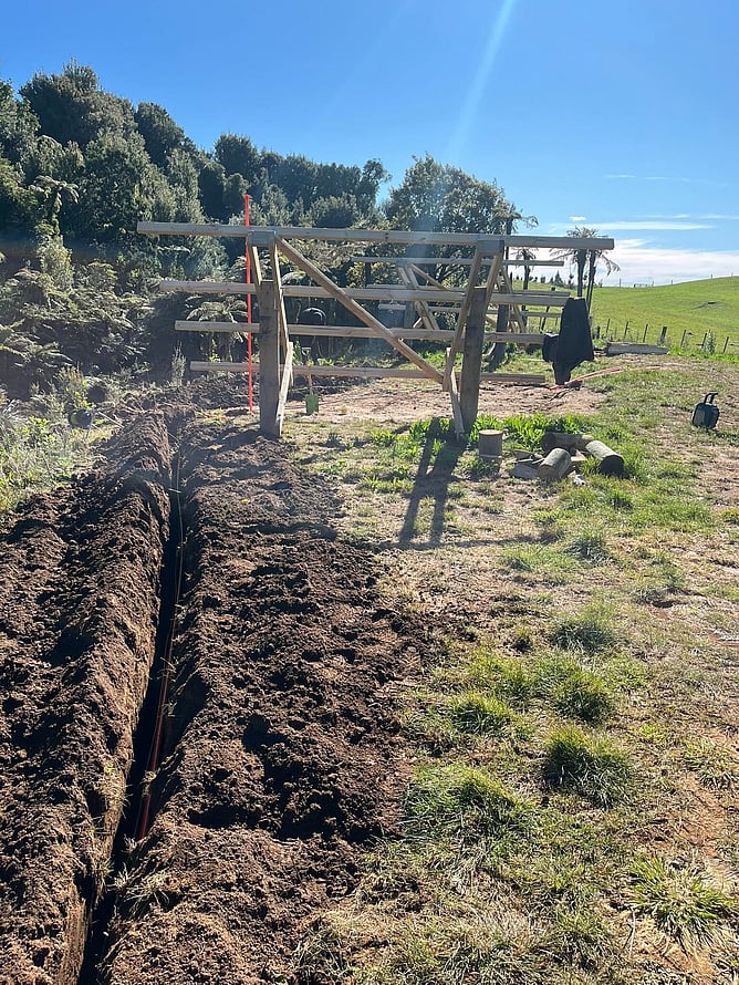 Cable trenching during off-grid solar installation, Western Bay of Plenty