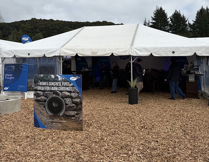 Humes' 6x9 marquee hire with uplights at Fieldays 2026, showcasing concrete pipes and water troughs