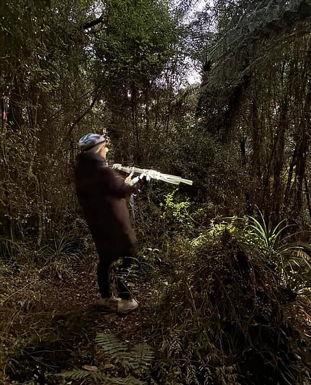 Jo using a device used to pick up transmitters (on kiwi)