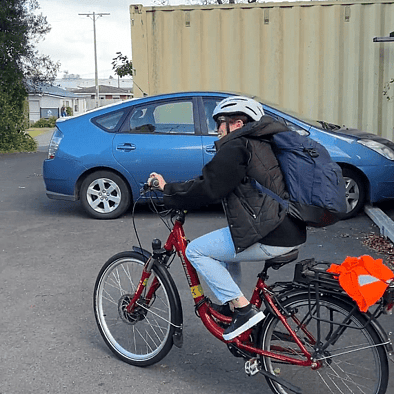 Melanie cycling to work