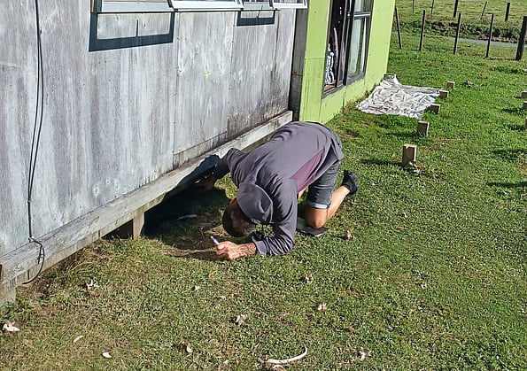 Our home assessors check under homes - looking for insulation and leaks