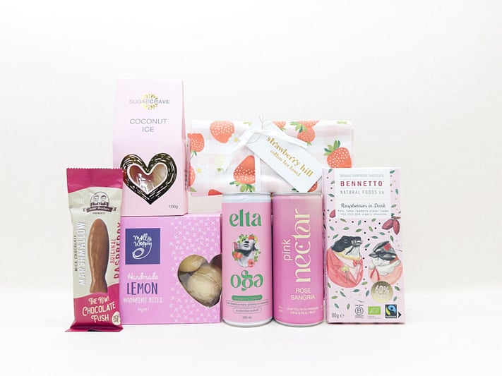 Pretty in Pink gift box NZ &mdash; NZ-made gift box with sangria, chocolate fish, Bennetto chocolate and tea towel