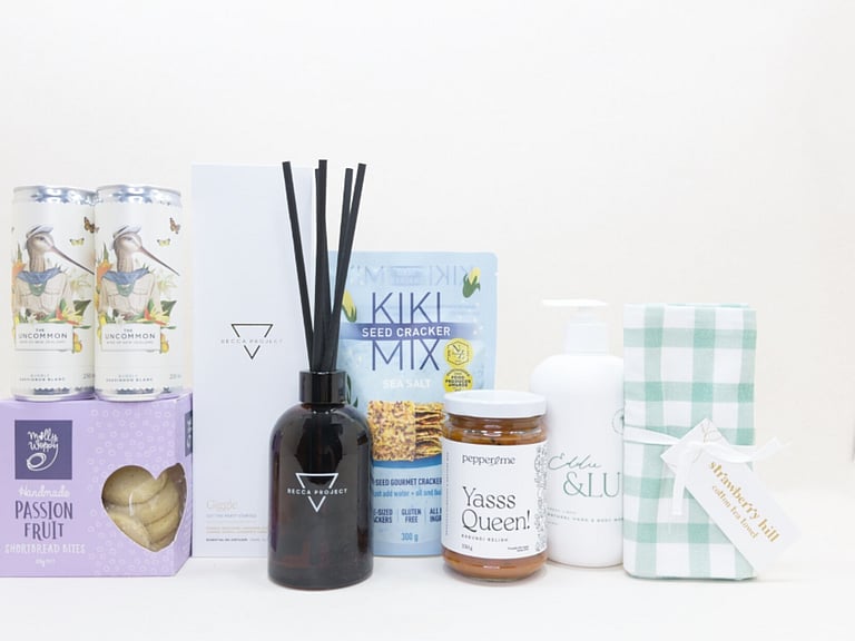 Home Treat gift box NZ — Becca Project candle, Uncommon wine cans, Pepper & Me relish, Kikki crackers and Eddie & Lu hand and body wash