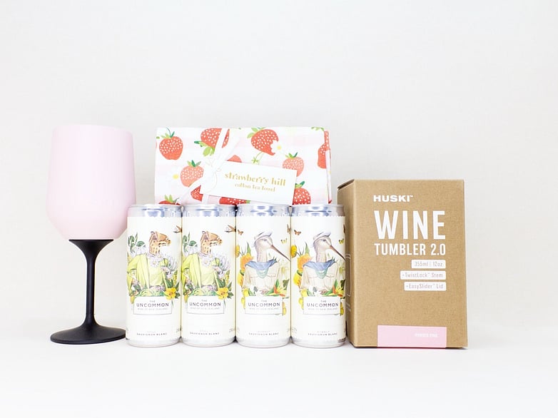 Pretty Wine gift box NZ &mdash; premium NZ-made gifts including Uncommon wine cans, Huski wine tumbler and Strawberry Hill tea towel