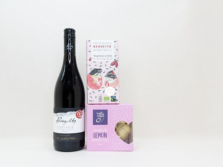 KYND Wine aRed Wine Gift Box featuring Roaring Meg wine, Bennetto chocolate, and Molly Woppy cookies in a premium KYND gift box.nd Chocolate Gift Box &mdash; NZ wine gift box with Roaring Meg red wine, Bennetto dark raspberry chocolate and Molly Woppy melting moments in signature white premium gift box