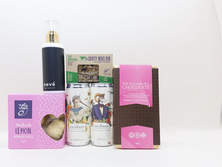 You Deserve This self-care gift box with Lemon Moment cookies, Neve room spray, Crafty Weka muesli bar, and Remarkable chocolate, thoughtfully presented in a premium gift box