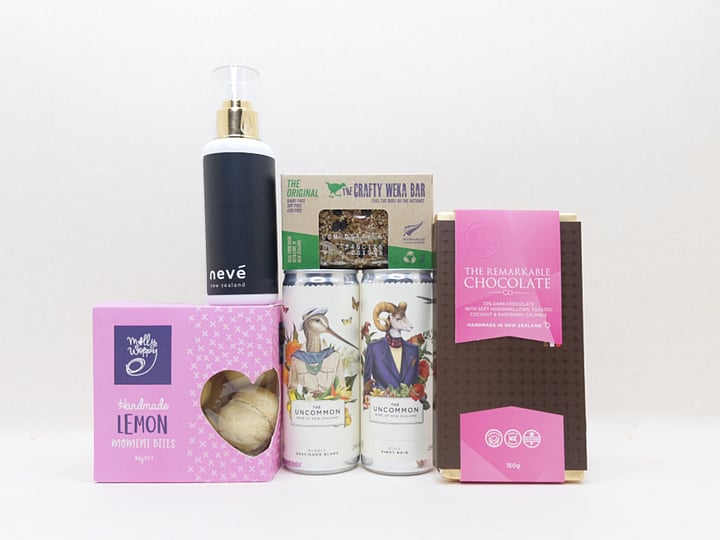 You Deserve This self-care gift box with Lemon Moment cookies, Neve room spray, Crafty Weka muesli bar, and Remarkable chocolate, thoughtfully presented in a premium gift box