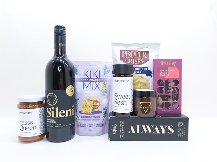Luxury Red Wine Hamper NZ — premium NZ-made wine hamper with red wine, artisan chocolate, chips and Becca Project candle