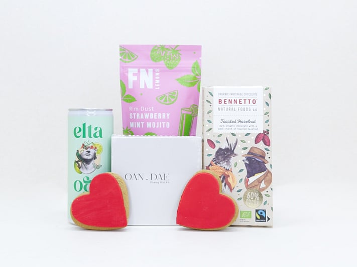 A Gentle Wish gift box with an OAN DAE wish paper kit, Elta Ego self-care products, FN dried lemons, and Bennetto chocolate, thoughtfully packaged as a gift of comfort, encouragement, and support