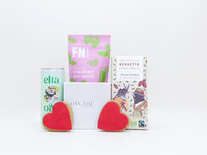 A Gentle Wish gift box with an OAN DAE wish paper kit, Elta Ego self-care products, FN dried lemons, and Bennetto chocolate, thoughtfully packaged as a gift of comfort, encouragement, and support
