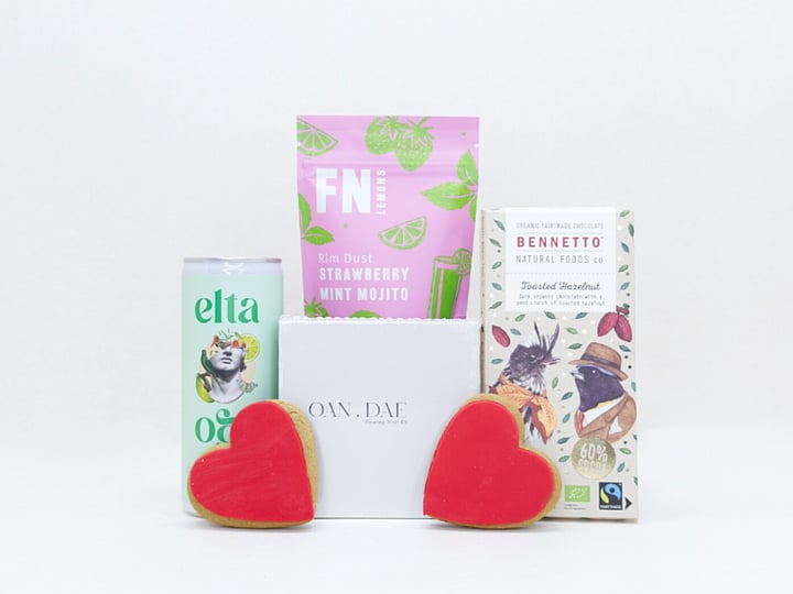 A Gentle Wish gift box with an OAN DAE wish paper kit, Elta Ego self-care products, FN dried lemons, and Bennetto chocolate, thoughtfully packaged as a gift of comfort, encouragement, and support