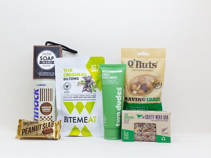 Bits & Bobs gift box with Onuts gourmet nuts, protein drink, Man Bar soap, Peanut Slab, Two Dudes face wash, and a Crafty Weka snack, packed with a little bit of everything and guaranteed to be enjoyed.