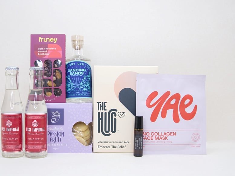 Evening Reset gift box NZ — NZ-made relaxation gift box with Dancing Sands gin, The Hug gel pack, Fruney chocolate and YAE face mask