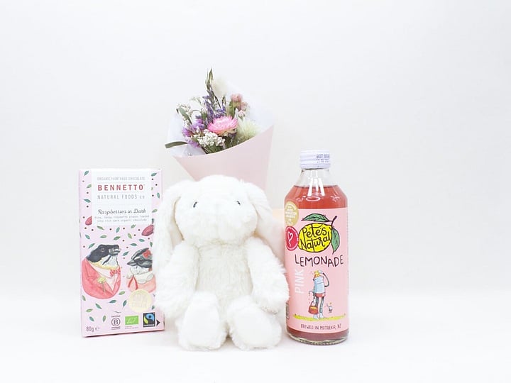 The Cute Gift Box featuring a cuddly teddy, dried flowers, artisan chocolate, and a refreshing Pete's Natural drink, beautifully packaged and ready to gift