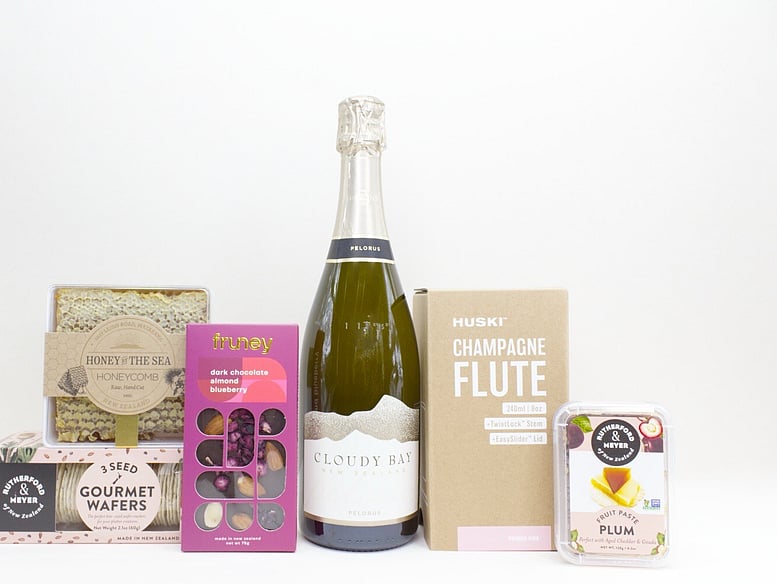 Sweet and Sparkling gift box NZ — premium NZ-made gift box with Cloudy Bay, Fruney chocolate, Huski flute and honey comb