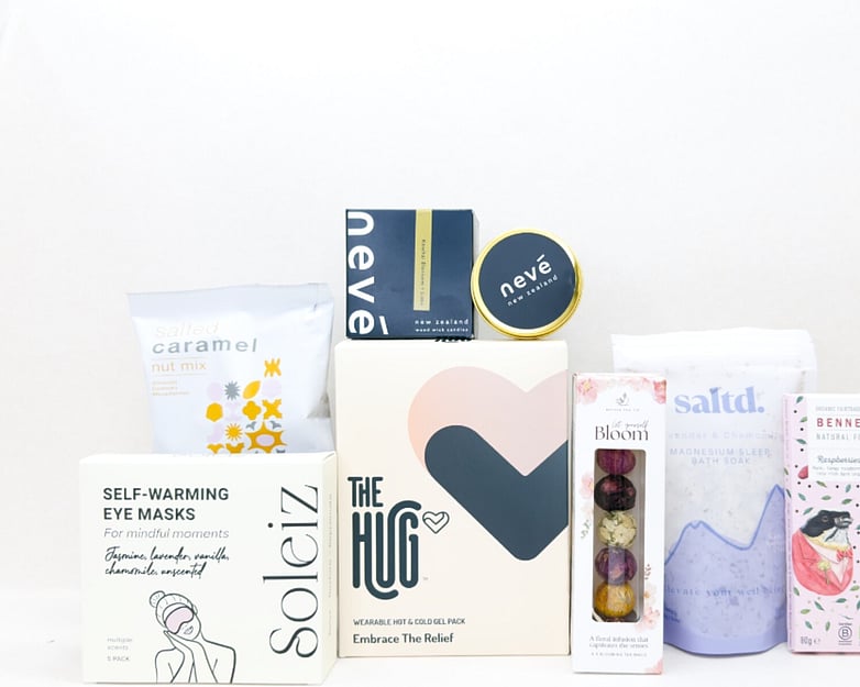 KYND Care Package Gift Box &mdash; NZ comfort gift box with HUG hot and cold gel pack, Nev&eacute; candle, bath soak, eye masks, Better Tea blooming tea balls and Bennetto chocolate in signature white premium gift box