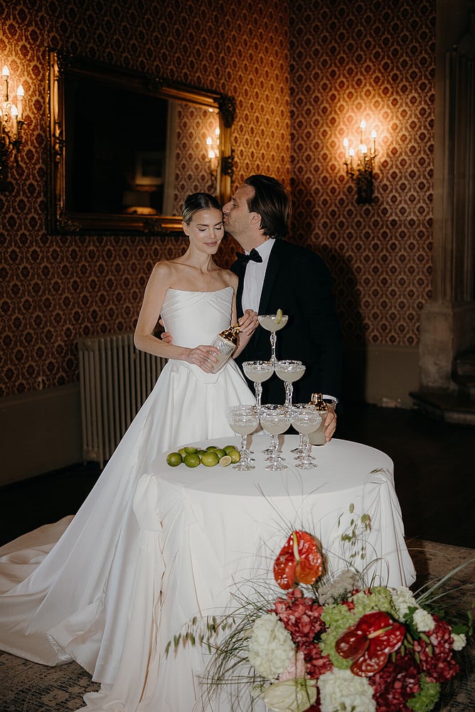Bride wearing bespoke wedding dress by Kate Edmondson