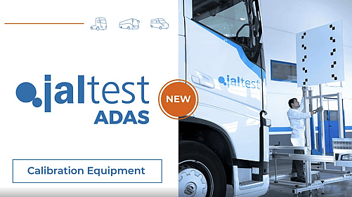 Technician using Jaltest ADAS calibration equipment on a commercial vehicle in a workshop